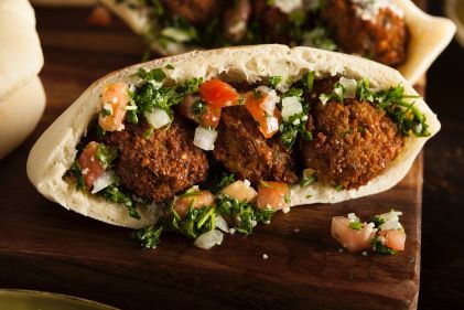 Close  up image, Paris street food, falafel in pita bread. 