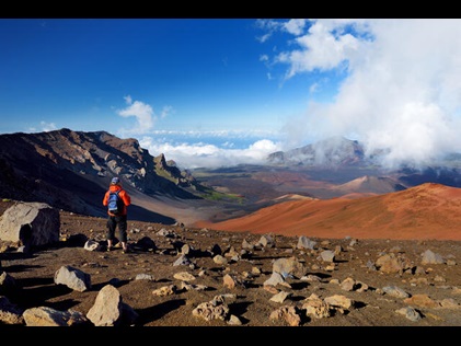 Man admiring Haleakala National Park in Maui.