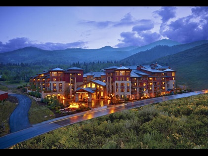 Sunrise Lodge, a Hilton Grand Vacations Club in Park City, Utah a glow on a summer night. 