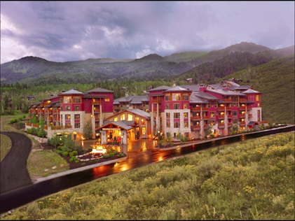 Aerial shot of Sunrise Lodge, a Hilton Grand Vacations Club nestled in mountains in Park City, Utah. 