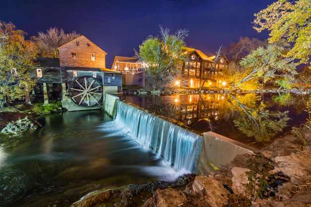 Historic Old Mill Square lit up at night, Pigeon Forge, Tennessee. 