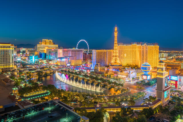 Stunning aerial image of Las Vegas Strip glowing in the night sky, Las Vegas. 