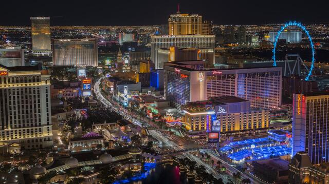 Stunning aerial image, Las Vegas Strip glowing against night sky, Las Vegas, Nevada. 