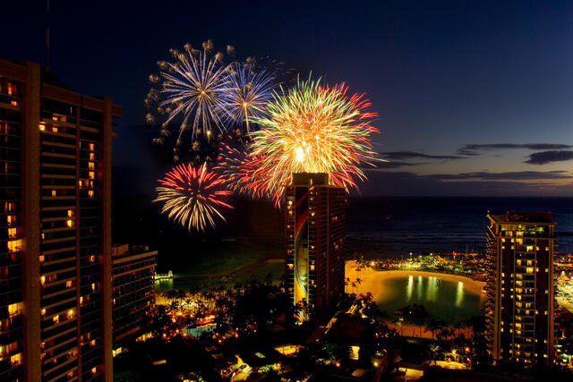 Fireworks bursting beautifully over Hilton Hawaiian Village®, Oahu, Hawaii. 