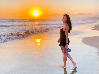 A Hilton Grand Vacations Owner enjoying the sunset at Santa Monica in Southern California