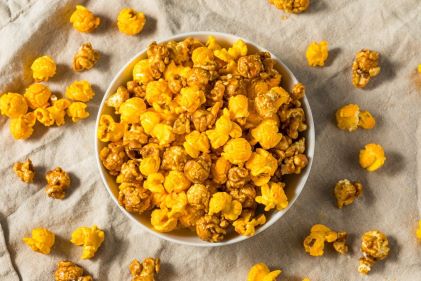 Flat lay image, Chicago street food, cheese and caramel popcorn. 