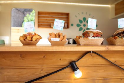 Pastries lining counter. 