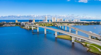Beautiful aerial image, Port Orange Bridge, clear blue skies, blue water, Daytona Beach, Florida. 