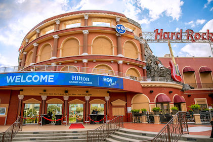 Exterior view of the Hard Rock Live building with a Hilton Grand Vacations, HGV Live marquee sign