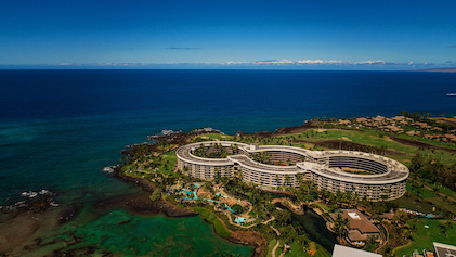 Stunning aerial shot of the coastline and sprawling grounds of Ocean Tower, a Hilton Grand Vacations Club, Waikoloa, Hawaii