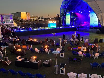An outdoor evening concert at the 2024 Hilton Grand Vacations Tournament of Champions