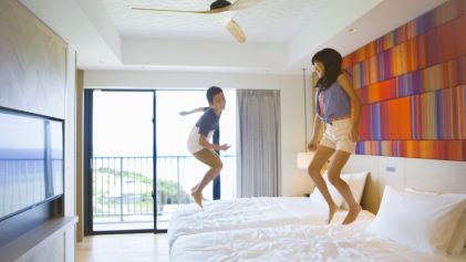 Kids jumping, Sosoko, a Hilton Club, Okinawa, Japan