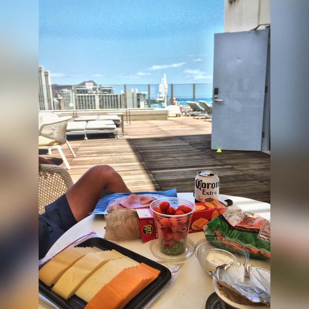 Snacking at the Hokulani Waikiki rooftop bar