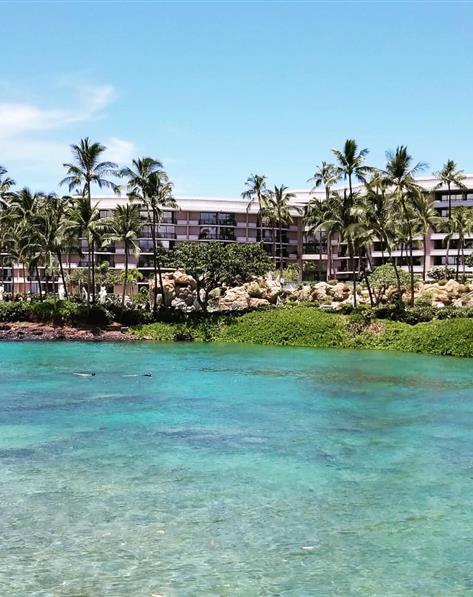 Small, clear lagoon in front The Bay Club at Waikoloa Beach Resort located on the Big Island, Hawaii.