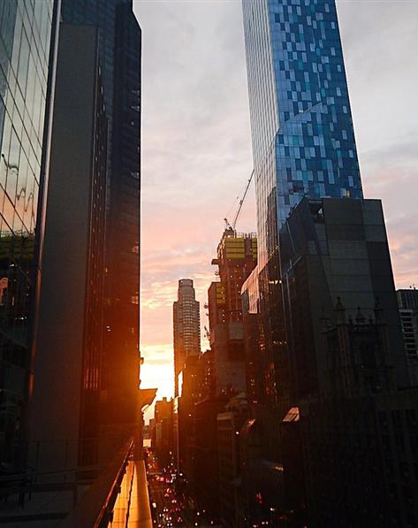 Sunrising in between New York City skyscrapers